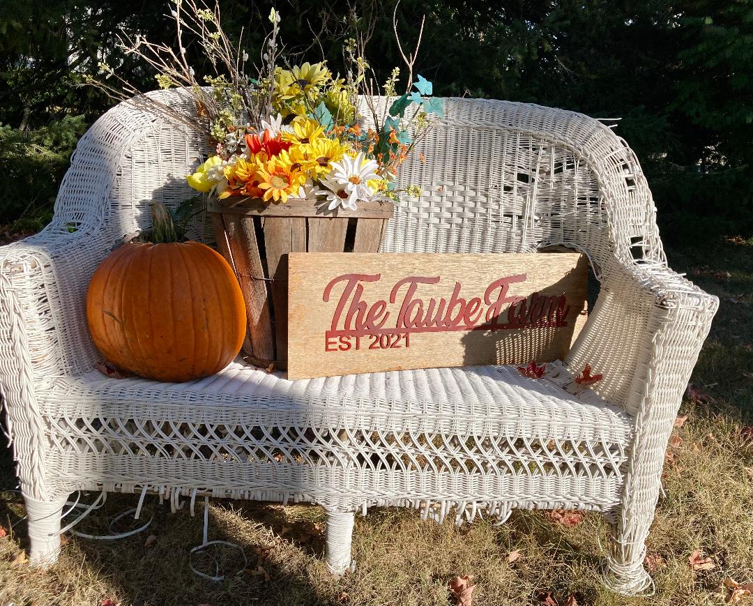 The Taube Farm Est. 2021 sign